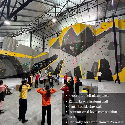A wide view of our massive, fully air-conditioned facility. With a 12-meter lead wall and a 6-meter bouldering wall, there's space for everyone to climb, train, and hang out.