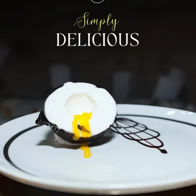 Break into my Mango Coconut Shell dessert to reveal a luscious mango center. This dessert is a tropical dream, combining the silky smoothness of coconut with the zesty sweetness of mango in a visually stunning presentation.