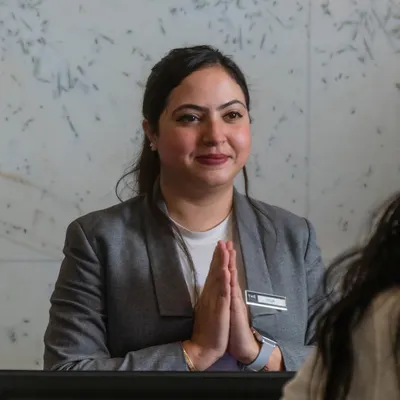 Meet Pooja, our Senior Front Office Associate. With a warm smile and a commitment to excellence, she ensures your every need is met from the moment you check in.