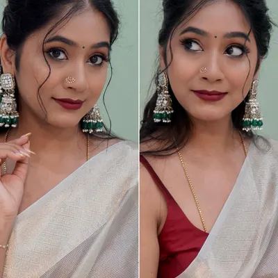 A simple and elegant look with a tissue saree, bold earrings, and a deep red lip. This is one of my favorite makeup looks I've created.