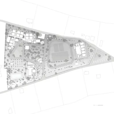 This is the proposed site plan for a new school campus near Ahmednagar. Our master plan strategically places the new primary school, a public library, and outdoor recreational areas to create a cohesive and integrated educational environment that respects the existing landscape.