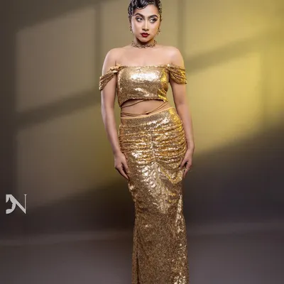 A full-length shot of my favorite high-fashion look. The golden outfit, bold makeup, and vintage-inspired finger wave hairstyle all came together to create this masterpiece.