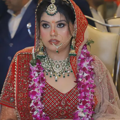 A candid moment of my bride Simran during her ceremony, with her makeup looking fresh and flawless.