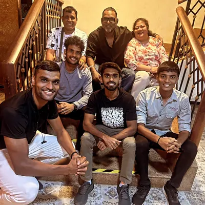The coaching staff and team members enjoying a moment of relaxation together. We believe in building strong relationships off the field, which translates to better chemistry on it.