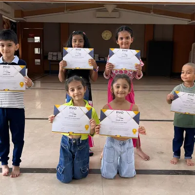 Proud smiles from our summer camp graduates. Each student receives a certificate to celebrate their dedication and the new skills they learned during our fun-filled camp.