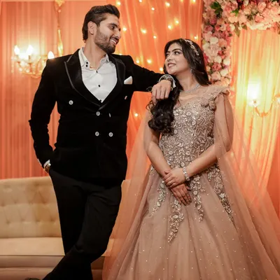 A portrait of Ishu and Tushar on their magical engagement day. We ensure we capture full-length shots that showcase the beautiful details of your ceremonial attire and the celebratory ambiance.