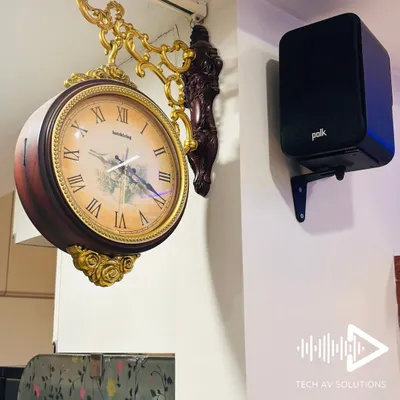 Here is a Polk Audio ES10 bookshelf speaker I mounted on the wall. It's a versatile speaker that works perfectly for surround sound in a home theater setup, providing that immersive, cinematic experience for movies and gaming.
