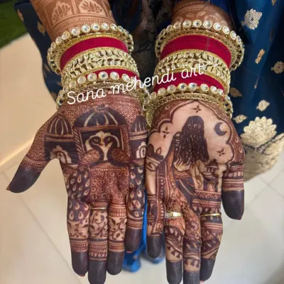 The perfect dark maroon stain. This is the result of my all-natural henna paste and proper aftercare. The colour looks stunning with the bride's red and gold bangles.