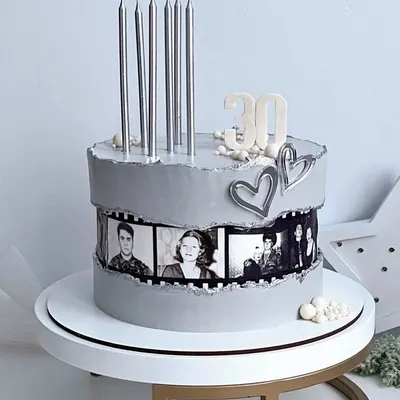 I love bringing your stories to life, and this custom 30th birthday cake was a special one. The sleek grey frosting and tall silver candles create a modern look, while the film strip of black and white photos adds a touch of nostalgia. It’s a perfect way to celebrate a major milestone.