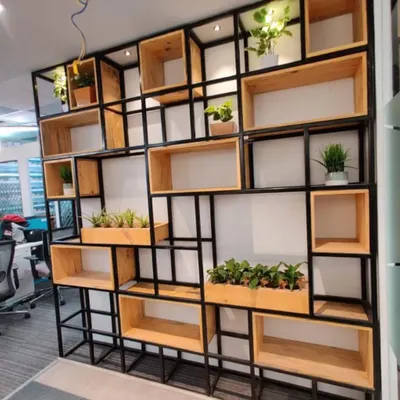 We are proud to share this completed commercial interior project for the healthcare brand "Healthians." This custom-built partition of metal and wood adds a natural and open feel to the office space.