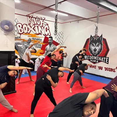 MMA and Zumba fusion is all about teamwork. We train for strength and endurance, then dance for cardio and fun, creating a full-body transformation together.