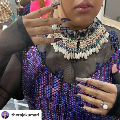 A close-up of the custom nails I created for The Raja Kumari to match her stunning Manish Malhotra outfit. The deep purple and black design has a shattered glass effect.