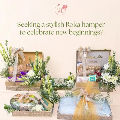 Seeking a stylish Roka hamper? This image displays a full set of coordinated hampers for a roka ceremony, featuring fresh florals, traditional sweets, and beautifully wrapped gifts.