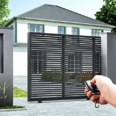 Imagine this convenience. With a simple click of a remote, your stylish, modern sliding gate opens, welcoming you home. I make this a reality by installing reliable and secure motorized gate systems.