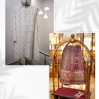 A minimalist shot of the bride and groom's wedding outfits, showcasing the elegant lehenga and sherwani.