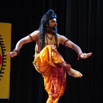 A moment of stillness and intensity during a Mayurbhanj Chhau performance. This pose, embodying the spirit of a deity, requires immense control and inner focus, which are central to our training.
