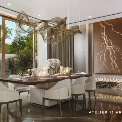 An alternate view of the farmhouse dining room, this time highlighting the custom leather art wall above the marble fireplace. The design creates a warm and inviting atmosphere, perfect for elegant dinners.
