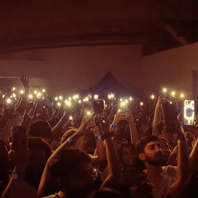 A sea of lights from the crowd at the White Party. This image perfectly captures the magic and unity we strive to create, where the audience becomes part of the show.