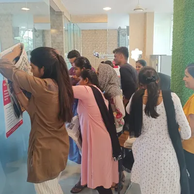 Here, our students are participating in a newspaper reading activity. This exercise helps improve reading speed, comprehension, and vocabulary while discussing current events.