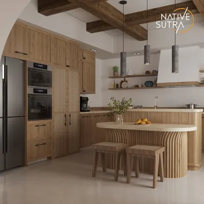 A warm and inviting kitchen that blends Modern Farmhouse and Organic Modern styles. This view highlights the sculptural, fluted breakfast island, rustic wood cabinetry, and integrated modern appliances.