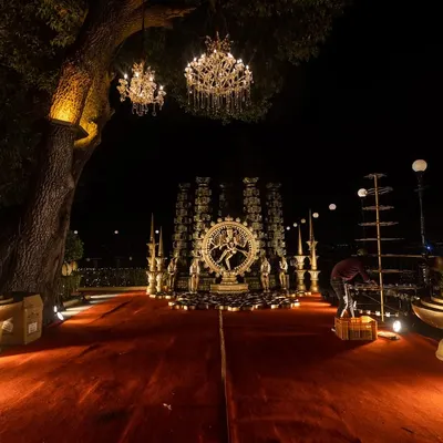 A divine setup featuring a Nataraja statue, creating a powerful and spiritual ambiance for a night event at Jagmandir Island Palace.