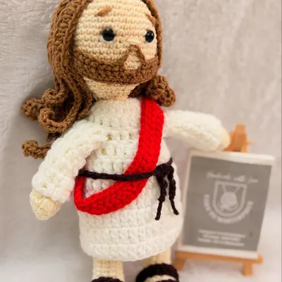 My handmade crochet Jesus Christ doll, a symbol of peace and faith. This 8-inch doll is made from 100% cotton yarn and is perfect as a spiritual keepsake or a gentle toy for children.