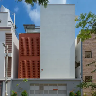 The sole design element of this home's exterior is the solid mass of brick, which stands still and bold. The dynamic play of light and volumes is revealed only once you step inside.