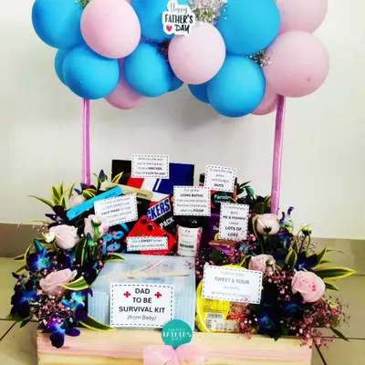 A special gift for Father's Day, this 'Dad to Be Survival Kit' is a fun way to celebrate the new dad. It's packed with snacks and goodies 'from the baby' to help him on his new adventure.