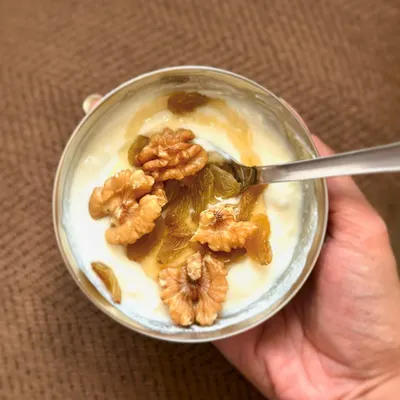 My go-to hack for sweet cravings: a simple bowl of Greek yogurt topped with walnuts, raisins, and a drizzle of honey. It's healthy, tasty, and incredibly satisfying.