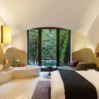 This is our Lake Access Room, where your private space opens directly to the calming water. It is designed for ultimate peace and privacy, blending luxury with nature.