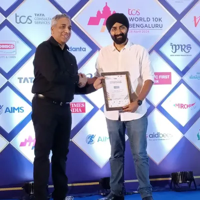 A proud moment for me and Running Roadies, receiving this certificate of appreciation from TCS World 10K. It's an honor to be recognized for our volunteering efforts for the third year in a row.