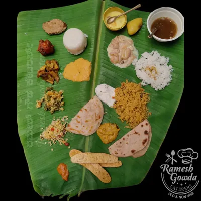 Our traditional vegetarian meal is a feast for the senses. Served on a banana leaf, it includes a variety of palyas, kosambari, rice, chapati, sweets, and other delicacies.