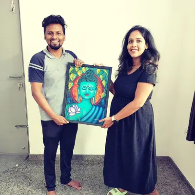 Delivering a custom Buddha painting to a happy client. I was pregnant here, and it was so special to create art during that time.