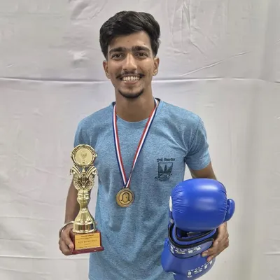 Aman Dulgaj after securing the Gold Medal and the coveted 'Best Boxer' award at the Mumbai University Championships. This is the level of excellence we strive for.