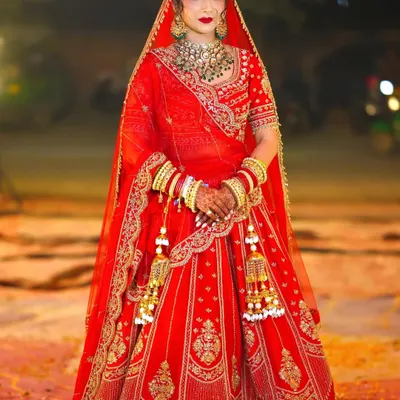 This is the classic red bridal look that so many of my brides dream of. I made sure she looked absolutely radiant and felt like a queen for her phera ceremony.