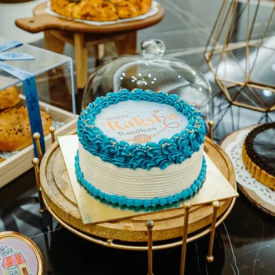 My Raksha Bandhan burn away cake is the ultimate surprise for your sibling. The top layer with the festive message burns away to reveal a special picture of you two underneath.