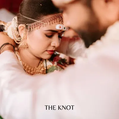 The sacred moment of tying the knot, captured with an intimate, emotional focus. We believe these quiet, profound rituals are the heart of a wedding story, and we aim to preserve their sanctity in our candid ceremony photography.