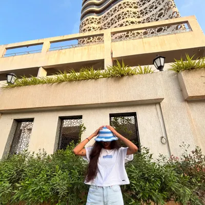 Soaking up the sun in my handmade wavy bucket hat. The blue and white design gives it a fun, cloud-like look.