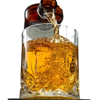 Capturing the perfect whiskey pour is all about timing and light. For this shot, I focused on freezing the motion to show the rich amber color and the energy of the splash, creating a sense of elegance and movement for beverage brands.