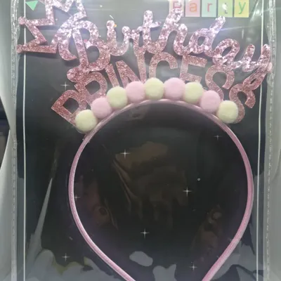 Make the birthday girl feel special with this "Birthday Princess" headband. It's a fun and sparkly accessory, perfect for photos and celebrating her big day.