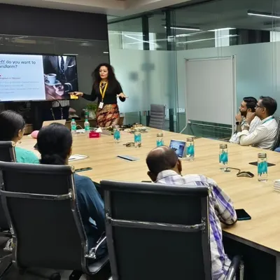 Leading a workshop for a global software company. A key part of my training is asking "Why do you want to transform?" to help participants connect their personal goals with their professional image.