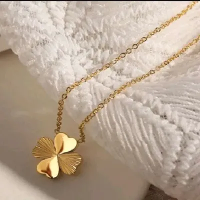 My popular four-leaf clover necklace on a delicate chain. This piece is a symbol of good luck and is crafted from stainless steel with a lasting gold-tone finish.