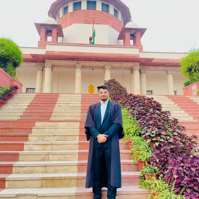 Standing before the Supreme Court of India, where I practice. I believe advocacy is a noble profession that requires unwavering devotion and sincerity to uphold justice for my clients.