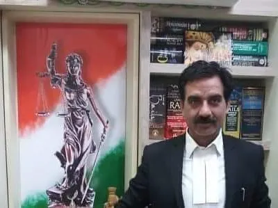 My office is a space for focused legal work, where I stand ready to represent my clients. The image of Lady Justice against our flag reminds me daily of my commitment to upholding the law with patriotism and integrity.
