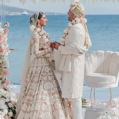 A serene moment from a destination wedding in Turkey, where the couple's vows are framed by the endless sea. We work to ensure the culinary experience is as breathtaking as the view.