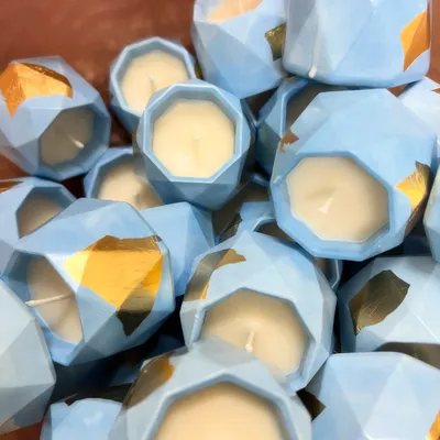 We customized these cute blue geometric candle jars with gold leaf for a baby announcement hamper. We love being a part of your special moments.