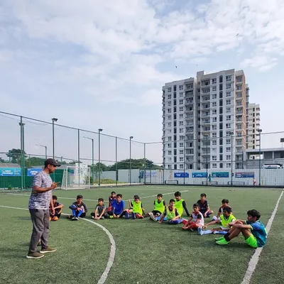 A team talk with our U15 football squad. Our coach discusses strategy and tactics on the turf as the team prepares for the upcoming KSFA Youth League.