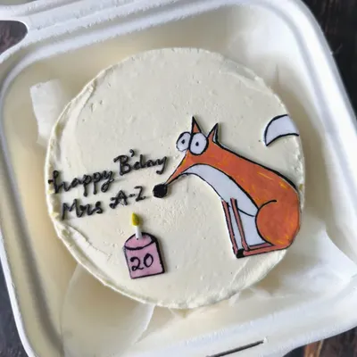 This sly fox bento cake is a fun and quirky design for a 20th birthday. The hand-drawn character adds a playful touch to the celebration.
