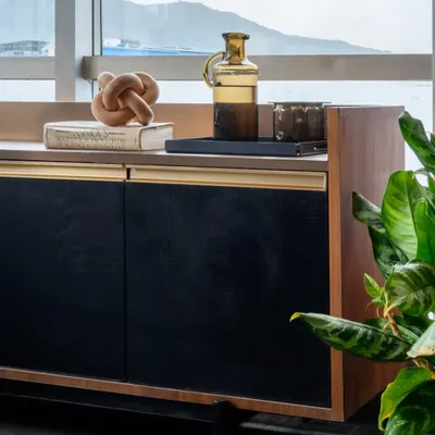 I love getting to design and build one of a kind pieces for a space. This console, with its combination of drawer and shutter storage, was tailor made for an office, providing stylish storage that you won't find in a catalog.