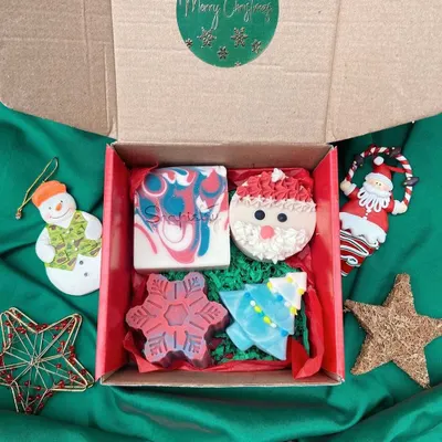 My Soapistry Christmas Gift Box is the perfect present! It includes a full-sized bar, a Santa soap, a Christmas tree, and a snowflake, all handmade and beautifully packaged.